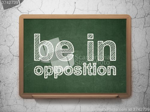 Image of Politics concept: Be in Opposition on chalkboard background