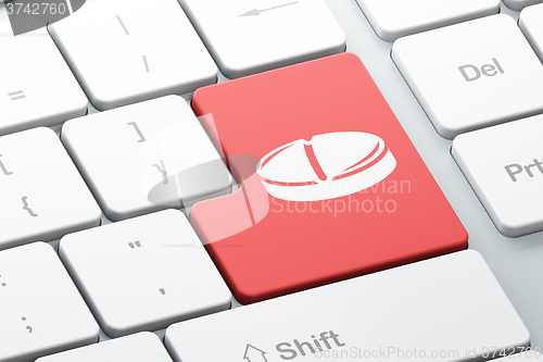 Image of Healthcare concept: Pill on computer keyboard background