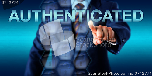 Image of IT Administrator Touching AUTHENTICATED Onscreen
