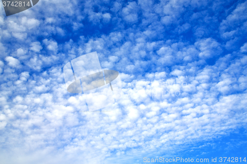 Image of in the blue sky white soft clouds and  