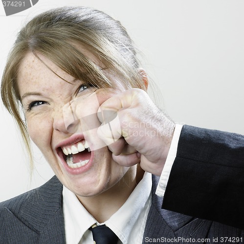 Image of Punched businesswoman