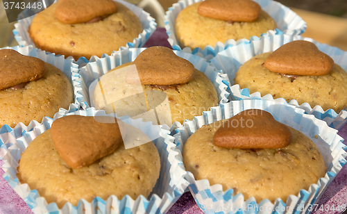 Image of Mini cupcake with decoration in the form of a heart.