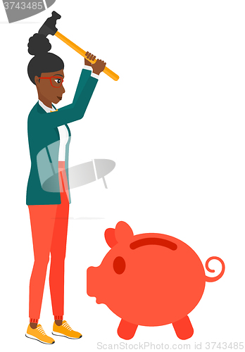 Image of Woman breaking piggy bank.