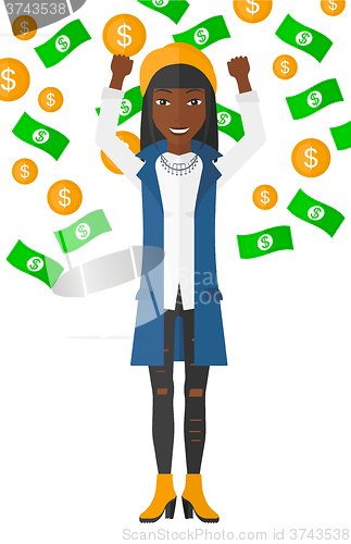 Image of Happy woman with  flying money. 