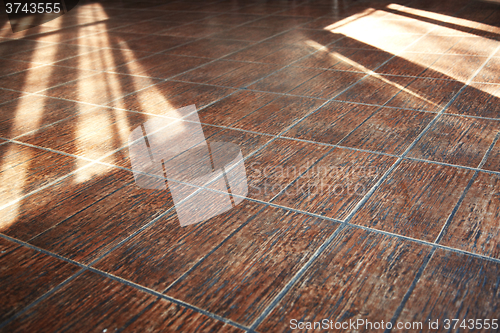 Image of Stony floor with sunlight shadows