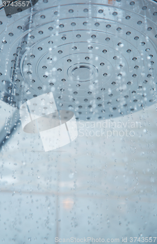 Image of Shower head with flowing water