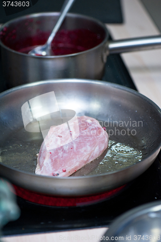 Image of chicken breast roasting