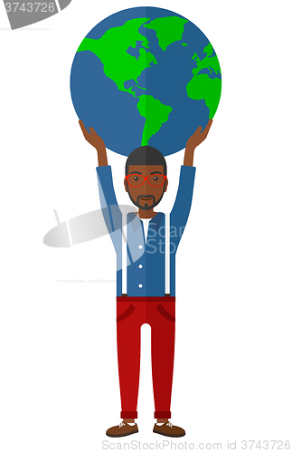 Image of Man holding globe.