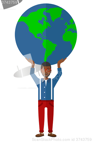 Image of Man holding globe.
