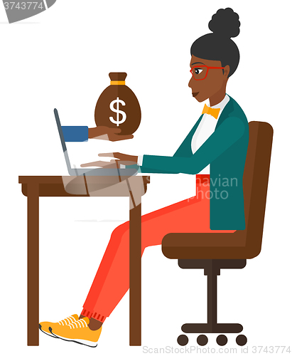 Image of Business woman working in office.