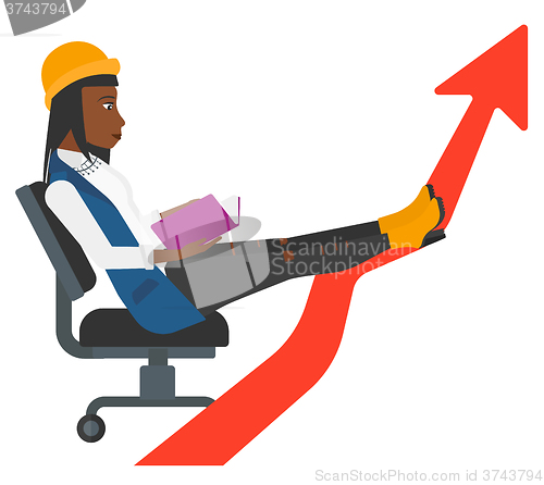 Image of Business woman reading book.