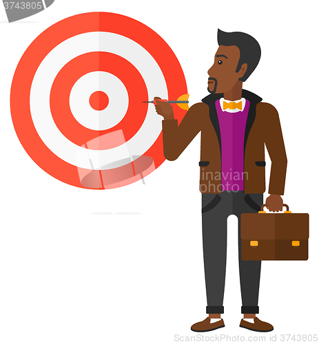 Image of Businessman with target board.