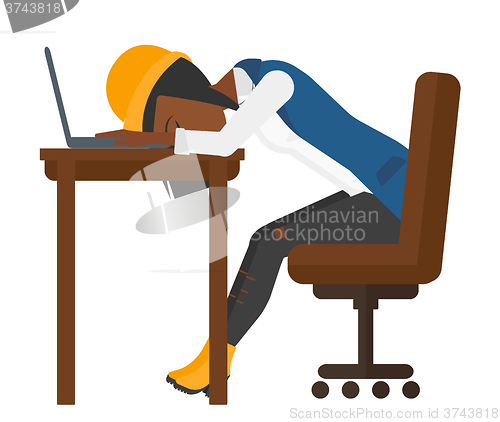 Image of Woman sleeping on workplace.