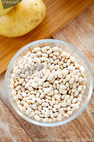 Image of close up of beans in glass bowl on table