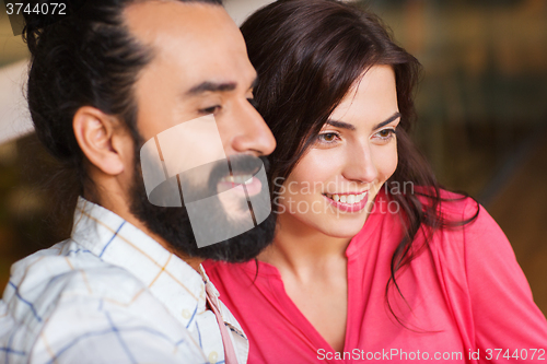 Image of happy couple at restaurant