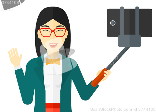 Image of Woman making selfie.