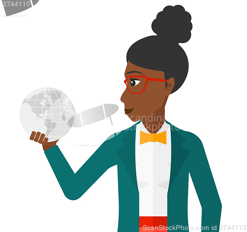 Image of Woman holding globe.