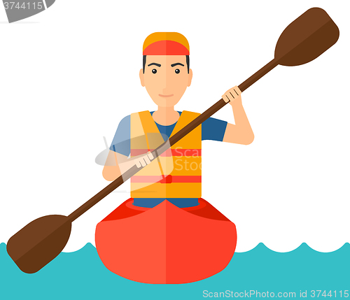 Image of Man riding in canoe.