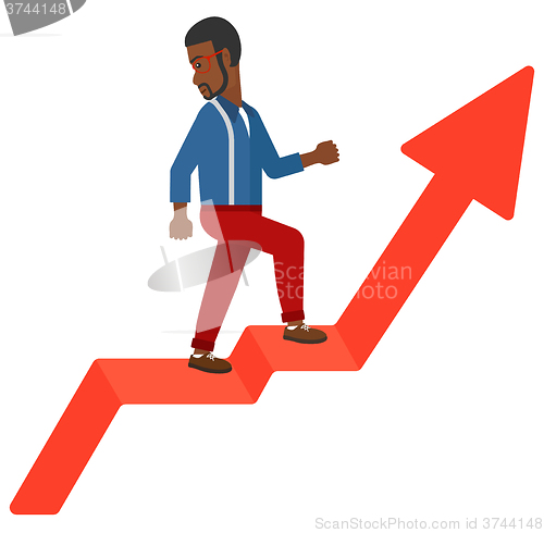 Image of Man standing on uprising chart.