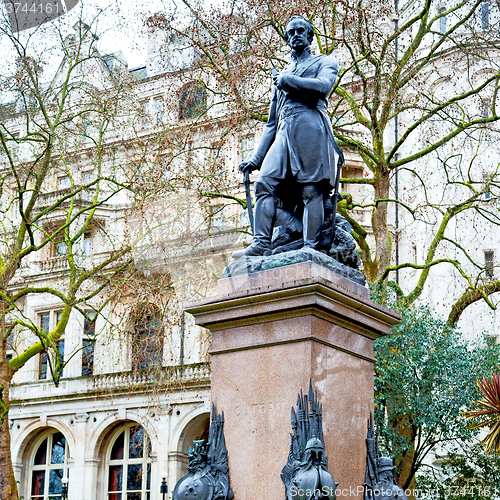 Image of historic   marble and statue in old city of london england