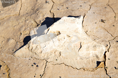 Image of brown dry sand in sahara desert stone rock