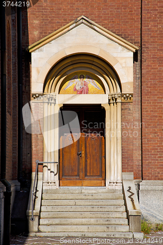 Image of door   in italy angel   closed brick  pavement