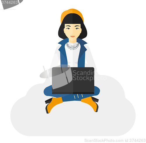 Image of Woman sitting with laptop.