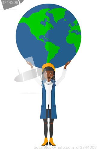 Image of Woman holding globe.