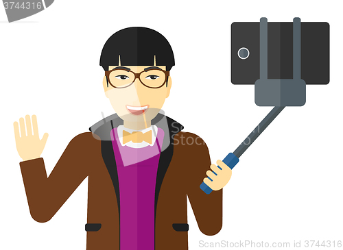 Image of Man making selfie.