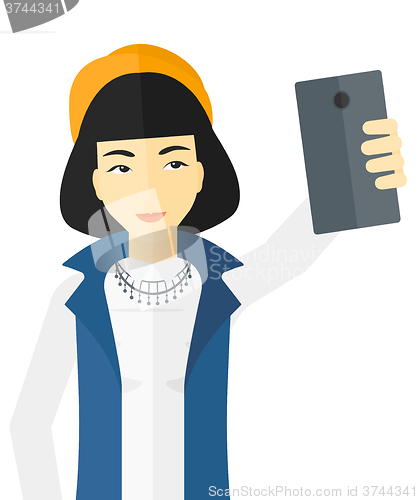 Image of Woman making selfie.