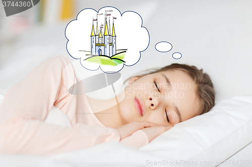 Image of girl sleeping in bed and dreaming of castle