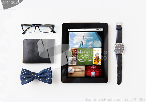 Image of tablet pc with web applications and personal stuff