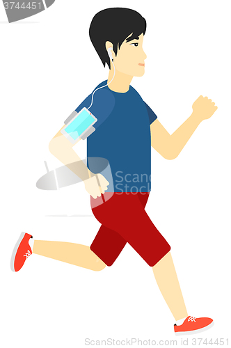 Image of Man jogging with earphones and smartphone.