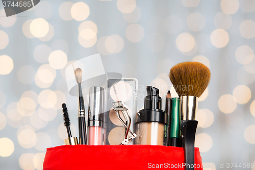 Image of close up of cosmetic bag with makeup stuff