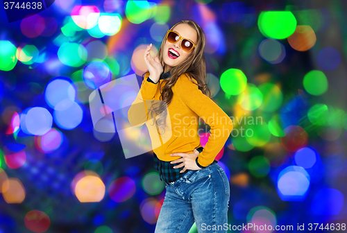 Image of happy young woman or teen girl in casual clothes