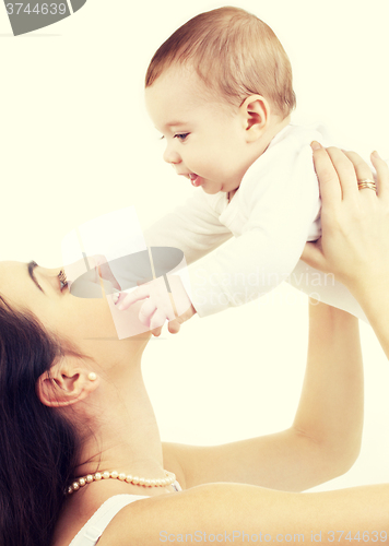 Image of happy mother with baby boy 