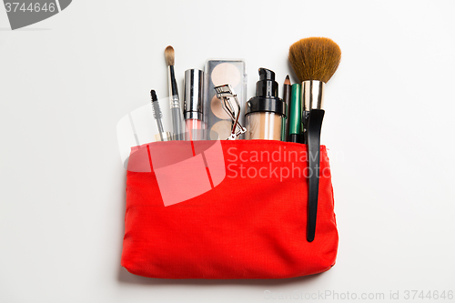 Image of close up of cosmetic bag with makeup stuff