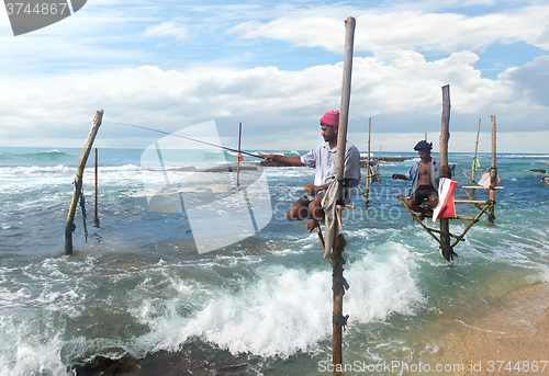 Image of Fishermen on stick