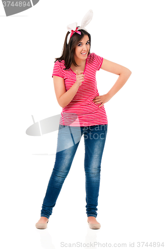 Image of Happy teen girl with white rabbit ears