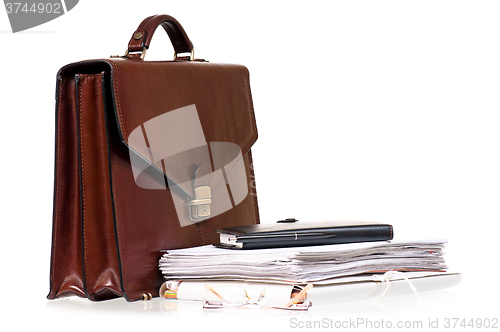 Image of Brown leather briefcase with folders