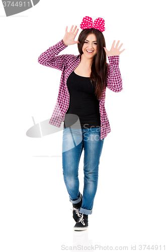 Image of Beautiful teen girl with big red bow