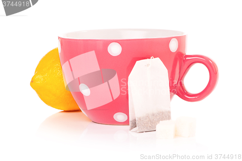 Image of Tea cup with teabag and lemon