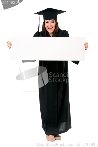 Image of Graduate student showing blank placard board