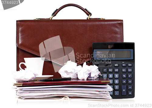 Image of Brown leather briefcase with office accessories