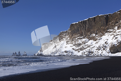 Image of Wide lens capture of the three pinnacles of Vik, Iceland in wint