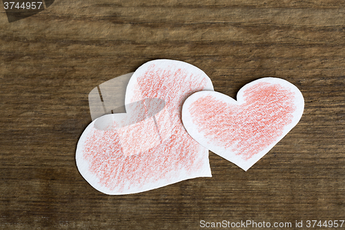 Image of Two red paper hearts