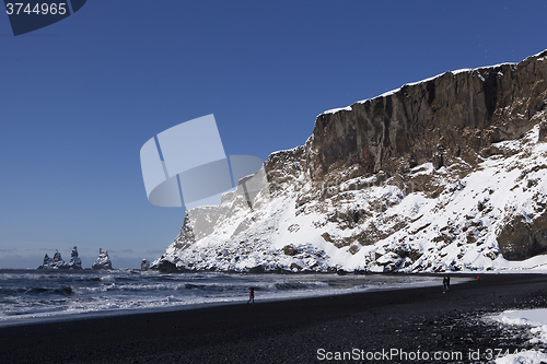 Image of Wide lens capture of the three pinnacles of Vik, Iceland in wint