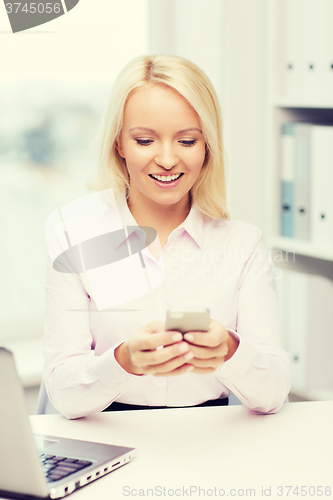 Image of smiling businesswoman or student with smartphone