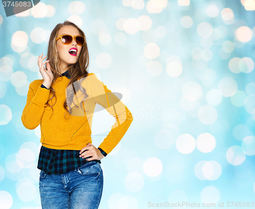 Image of happy young woman or teen girl in casual clothes