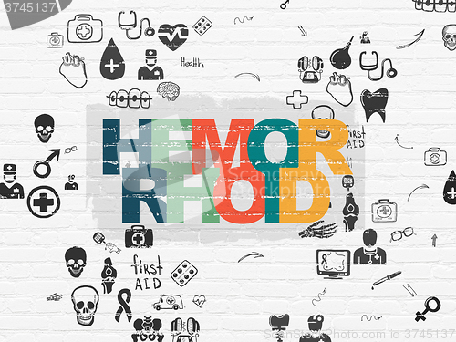 Image of Medicine concept: Hemorrhoid on wall background
